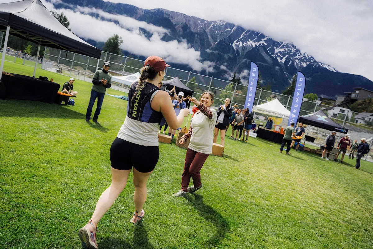 Volunteers cheering runners on course